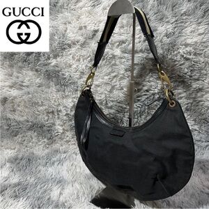 Gucci Black Hobo Bag with Gold Accents